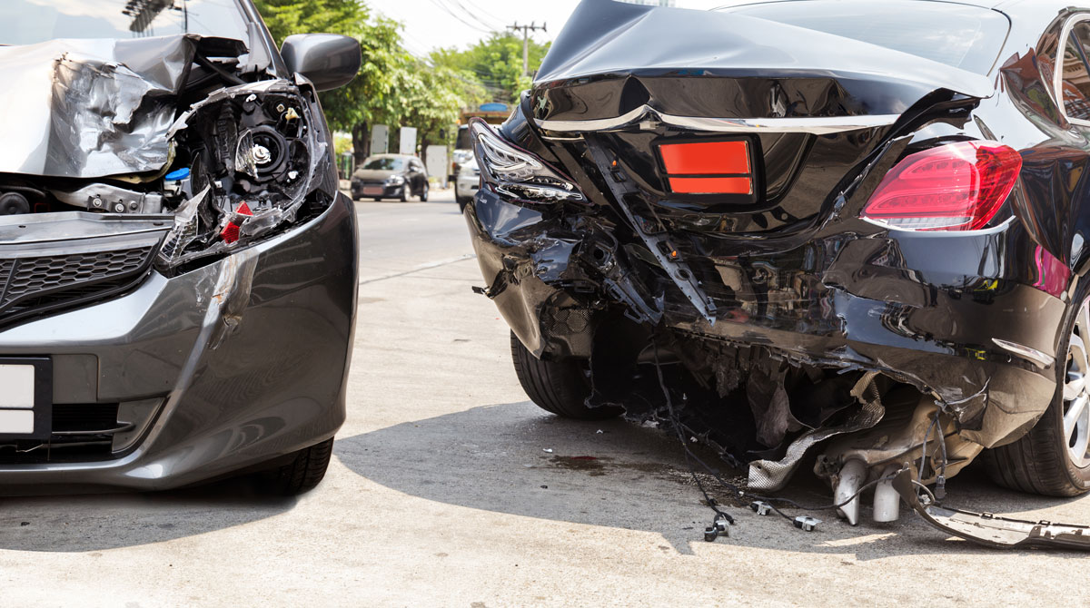 two cars seriously damaged after they crashed with each other