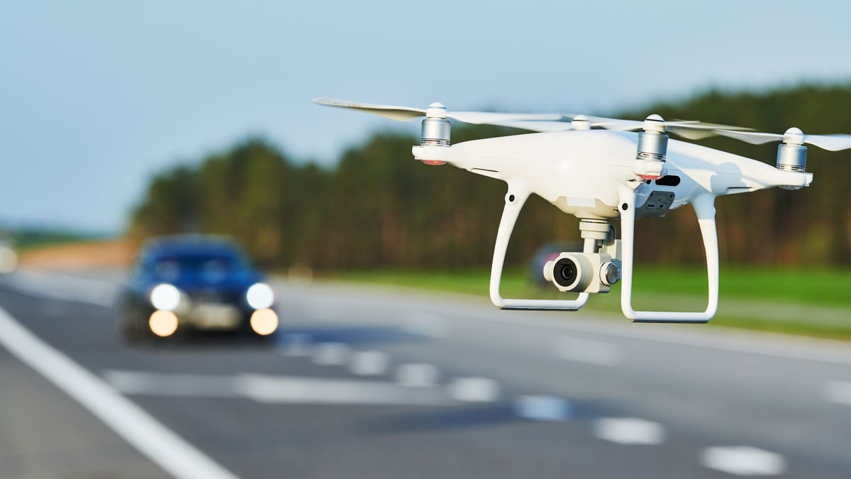 DJI Phantom 4 flying over the highway